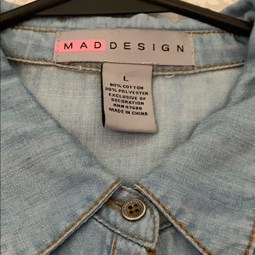 Button up blue jean top w/ slit down the bottom.